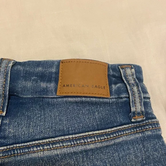 American Eagle Next Level Stretch Distressed Jean Shorts 00 - Picture 3 of 4